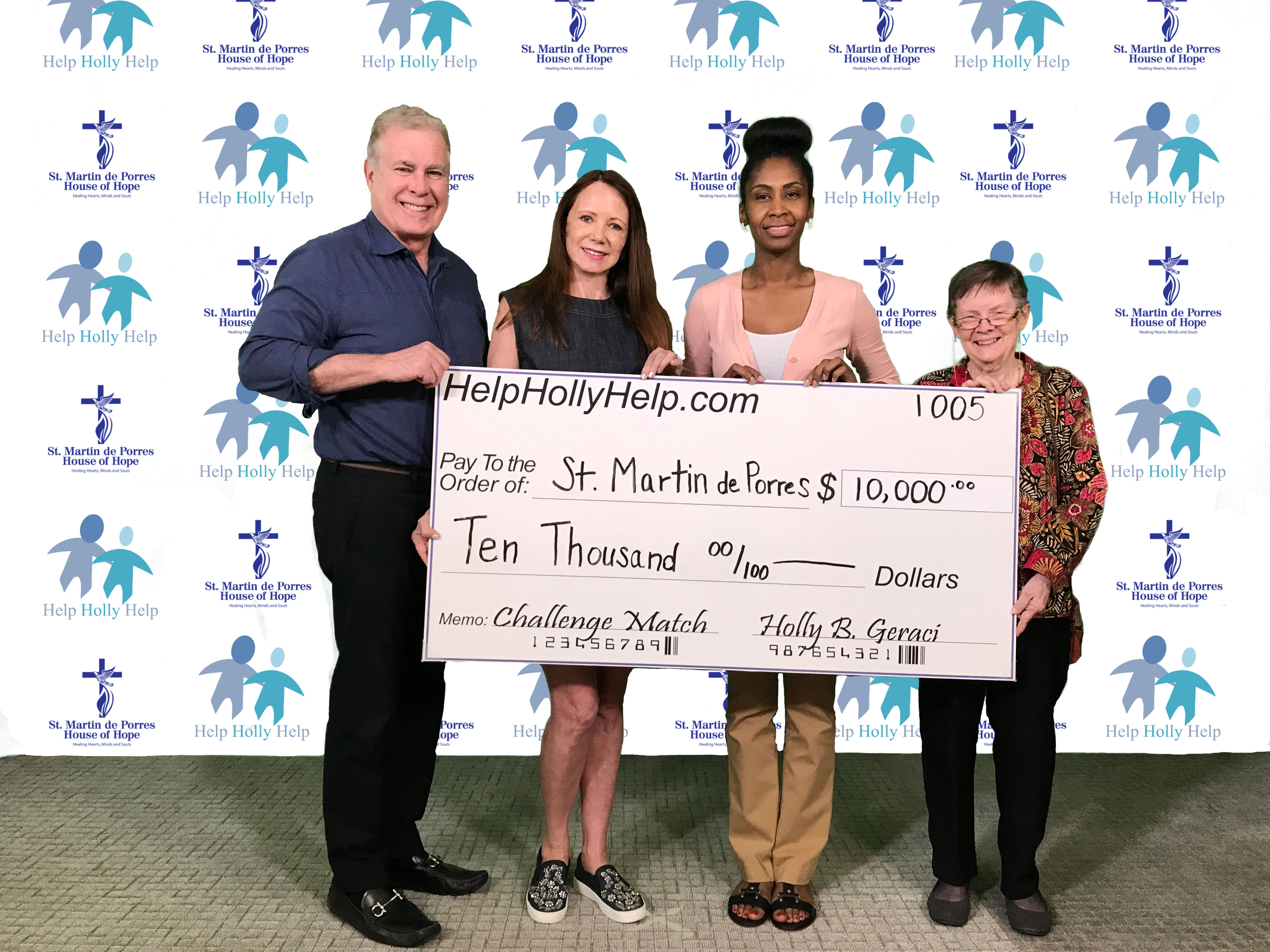 Photo of Holly Geraci & Peter Francis Geraci donating to St. Martin